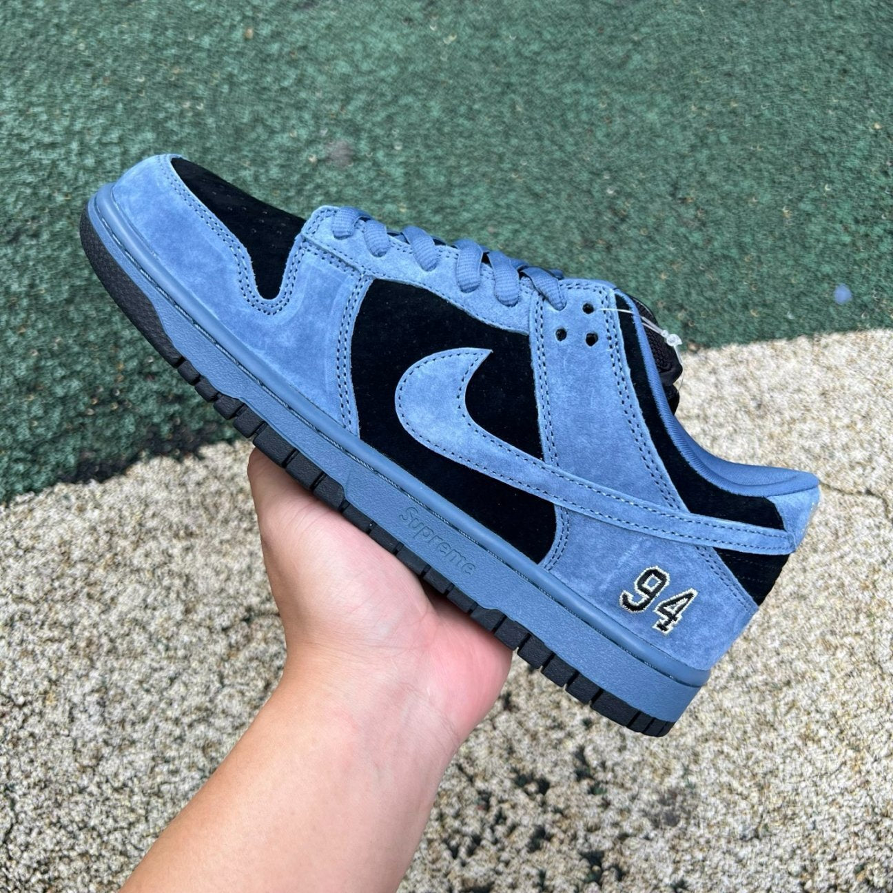 Supreme x Nike Dunk Low SB in the "Ocean Fog"