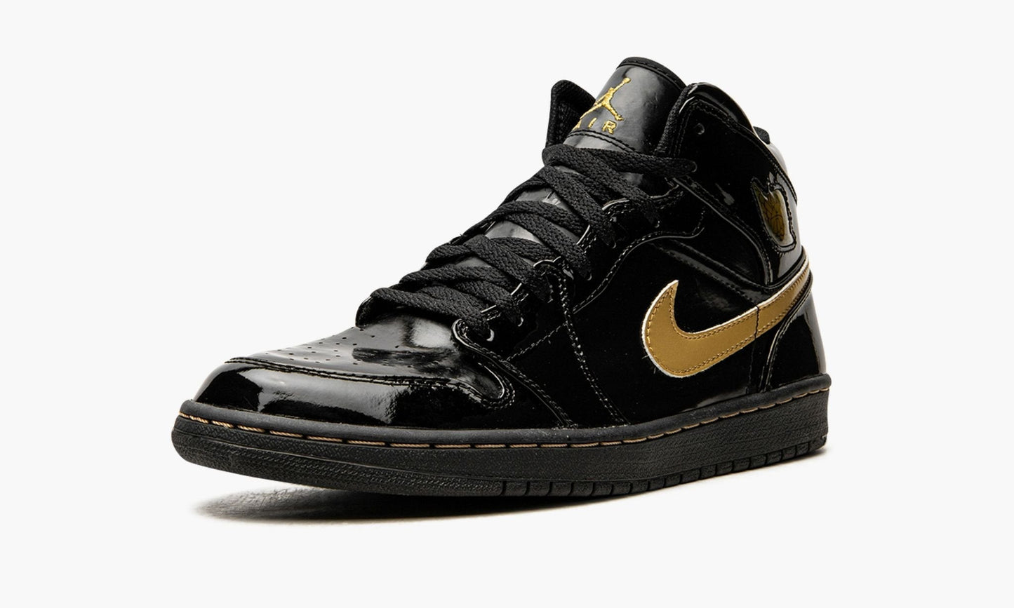 Air Jordan 1 Retro Black Metallic Gold ( 2003 )