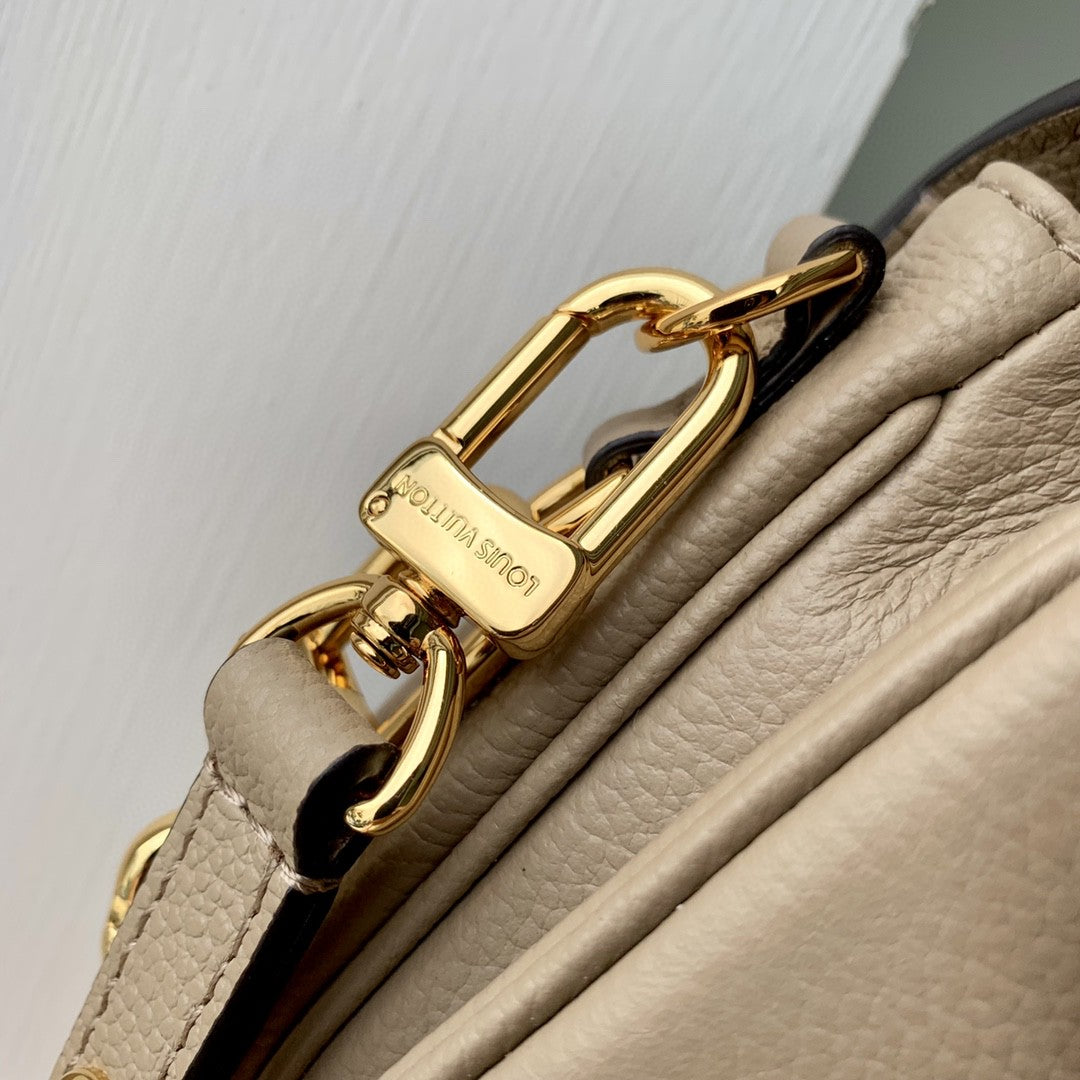 Louis Vuitton Pochette Métis East West - Monogram Empreinte Leather - Tourterelle/Crème