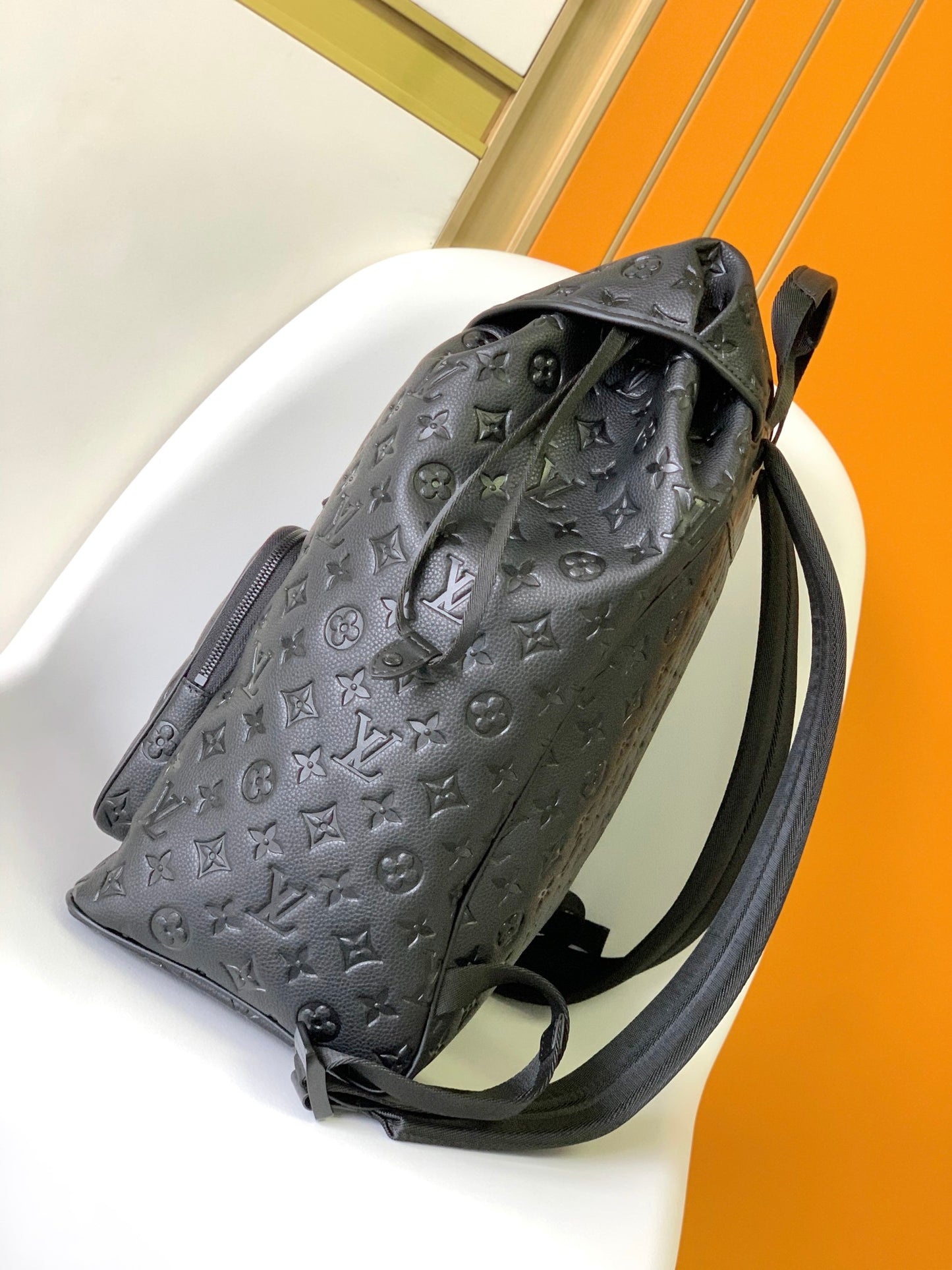 Louis Vuitton Matte Black Embossed Monogram Leather Backpack with Buckle Flap