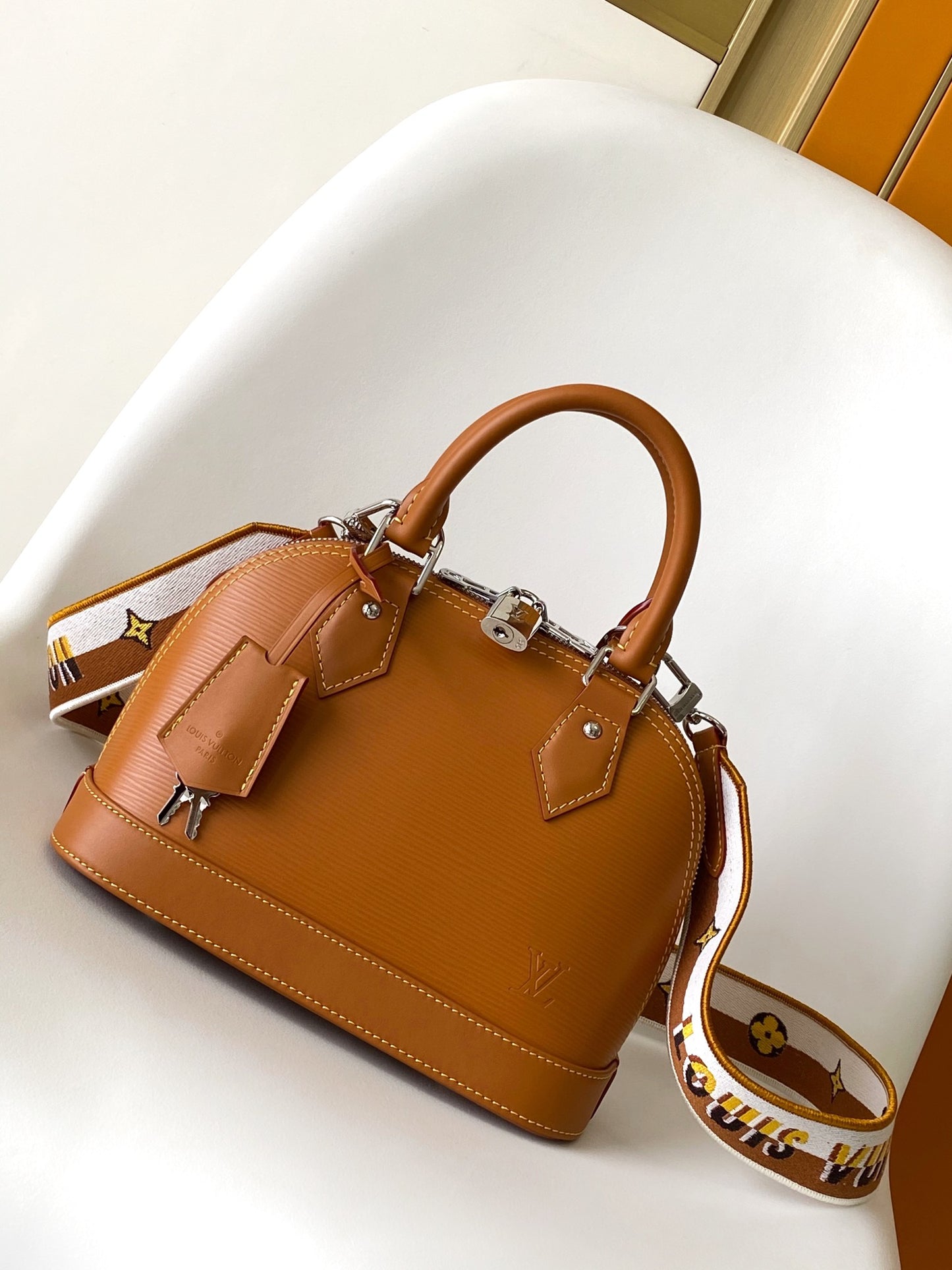 Louis Vuitton Textured Tan Leather Dome Handbag with Wide Crossbody Strap