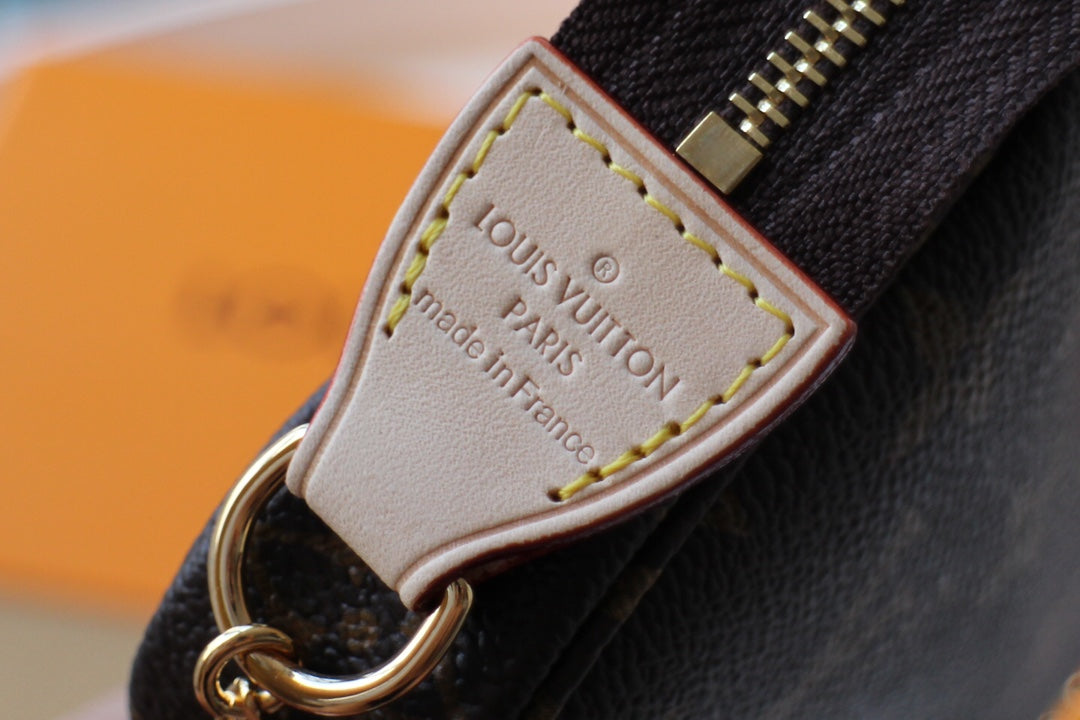 Louis Vuitton Mini Accessoires Pochette Monogram Canvas Brown