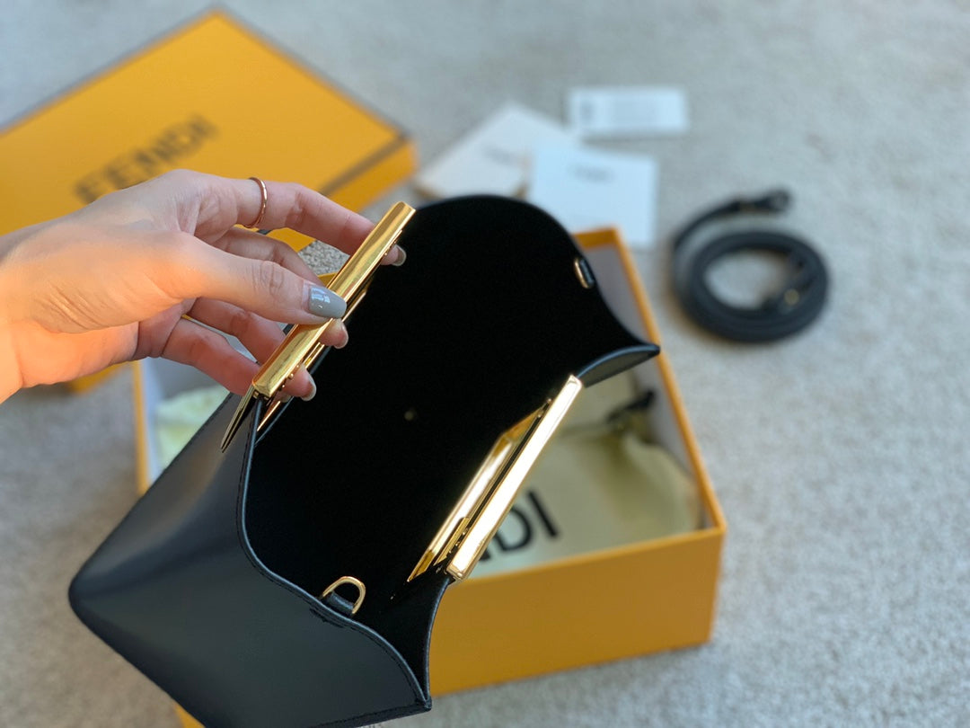 Fendi First Small Black Leather Clutch Bag with Gold-Finish Metal Handle