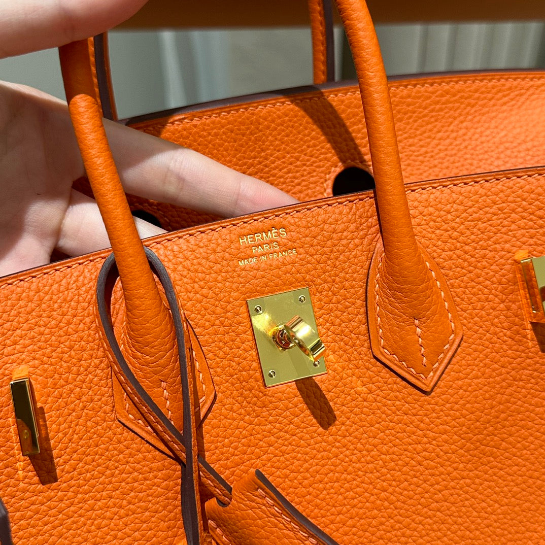 Classic Orange Leather Top-Handle Handbag with Gold-Tone Hardware