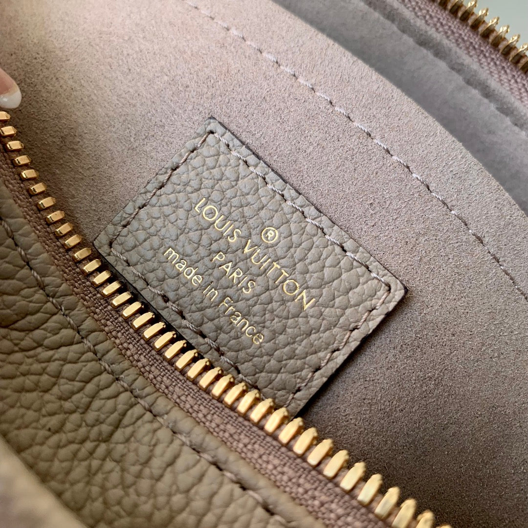 Louis Vuitton OnTheGo East West Bicolor Monogram Empreinte Leather Handbag - Tourterelle / Crème