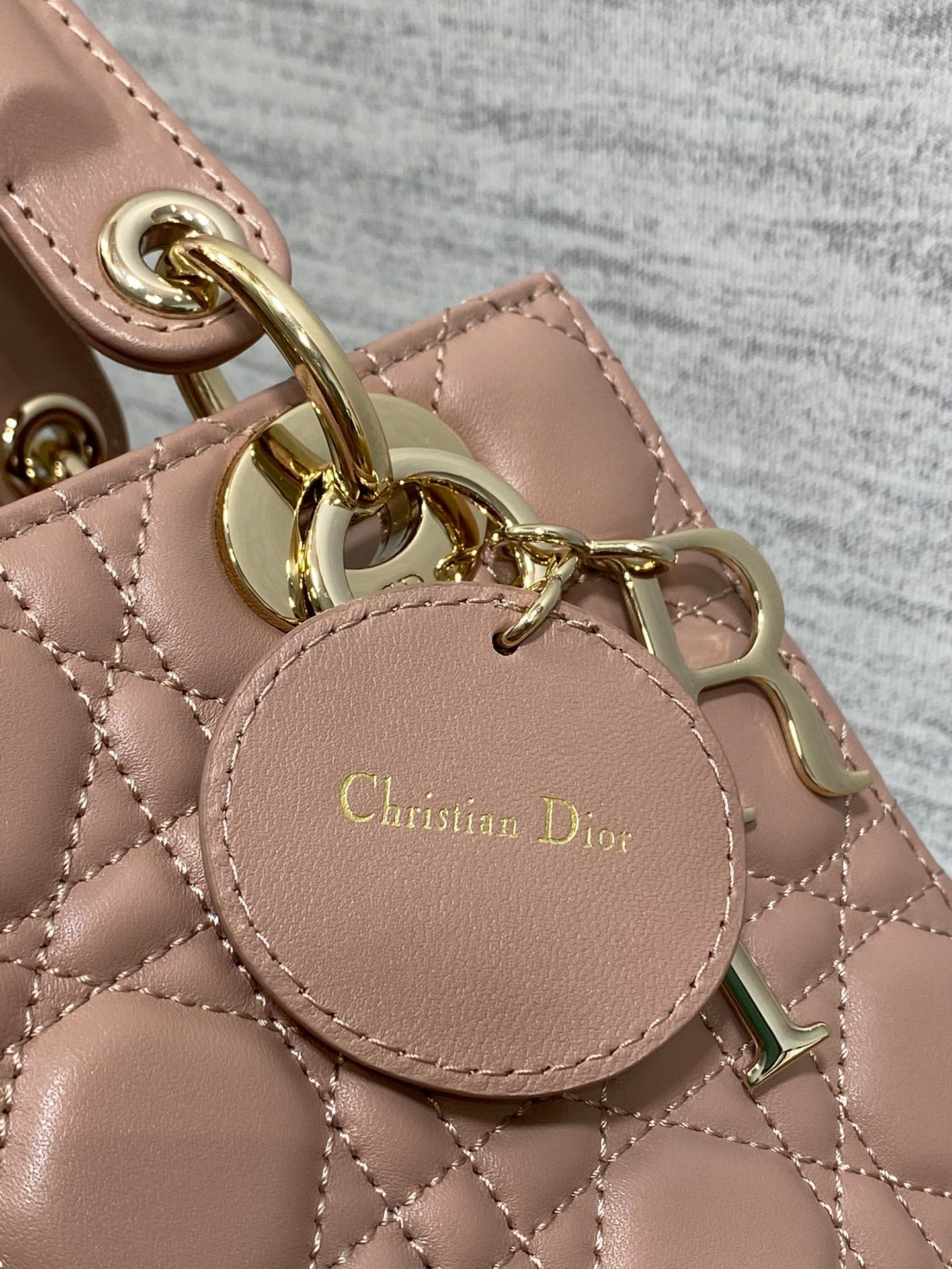 Dior Elegant Blush Pink Quilted Leather Handbag with Shoulder Strap