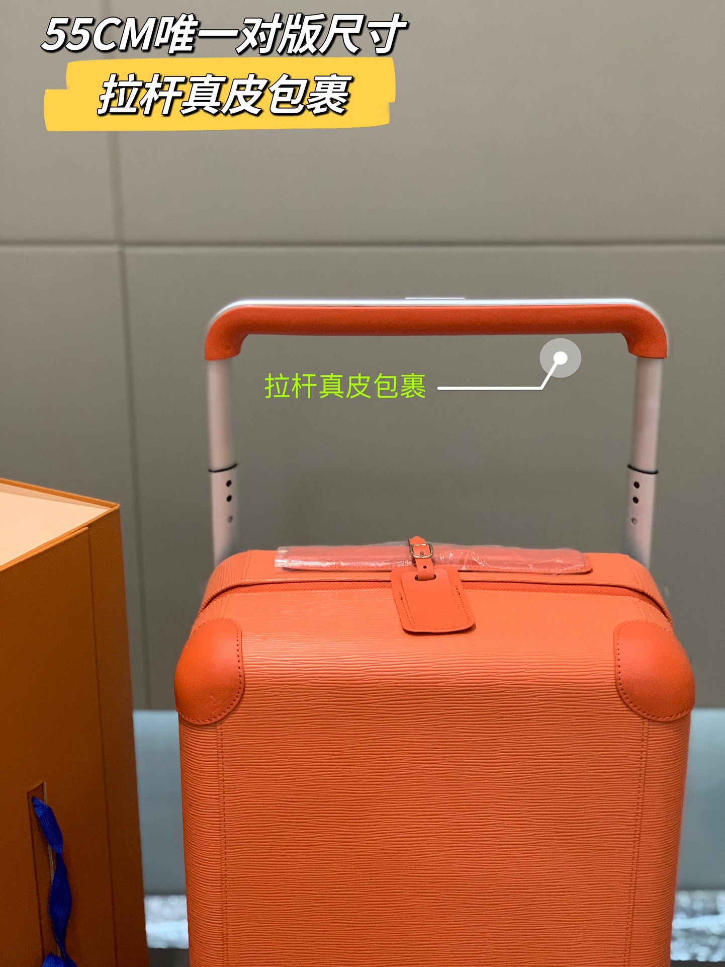 Orange Textured Leather Rolling Suitcase Luxury Carry-On Spinner Luggage