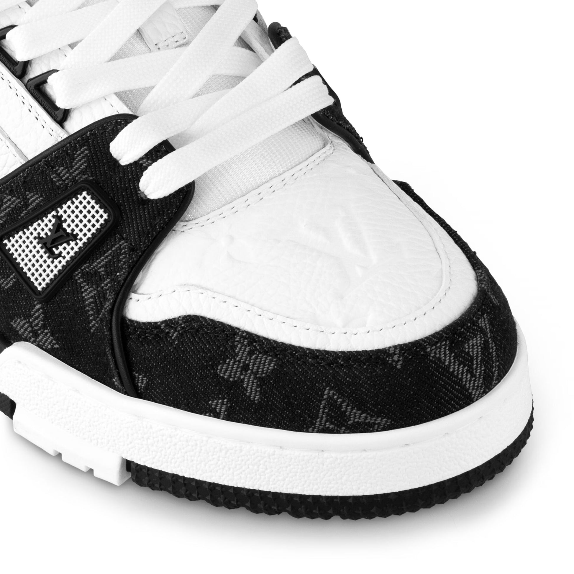 Louis Vuitton LV Trainer Maxi sneaker in black and white monogram denim and leather.