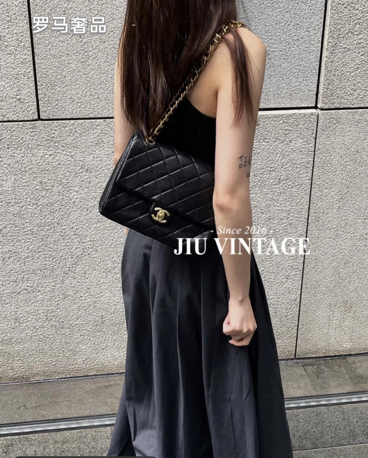 Chanel Black Quilted Lambskin Flap Bag with Gold-Tone Logo Chain