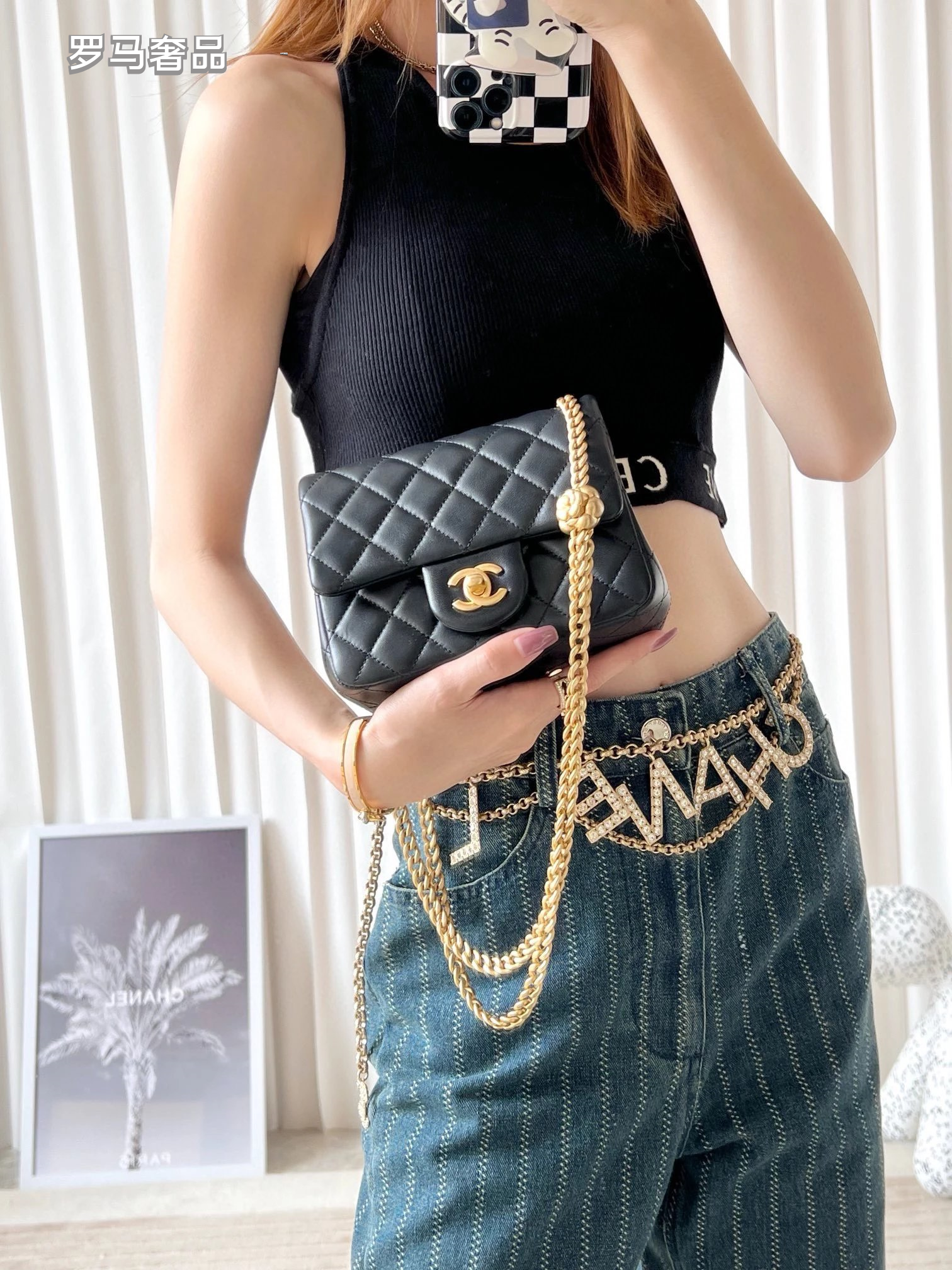 Black Quilted Leather Mini Flap Bag with Gold-Tone Chain and Camellia Charm
